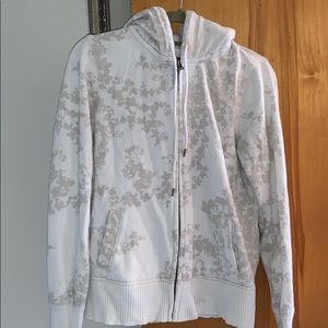 Beige and white American Eagle zip down hoodie